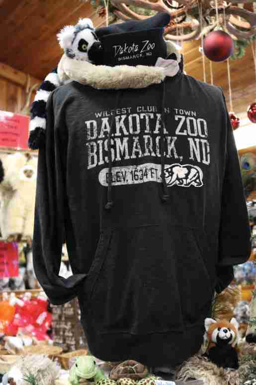 Plush works well as a display prop with this black hoodie at the Dakota Zoo. Mannequins are a good way to show customers how apparel will look, the store’s gift shop and office manager said.  